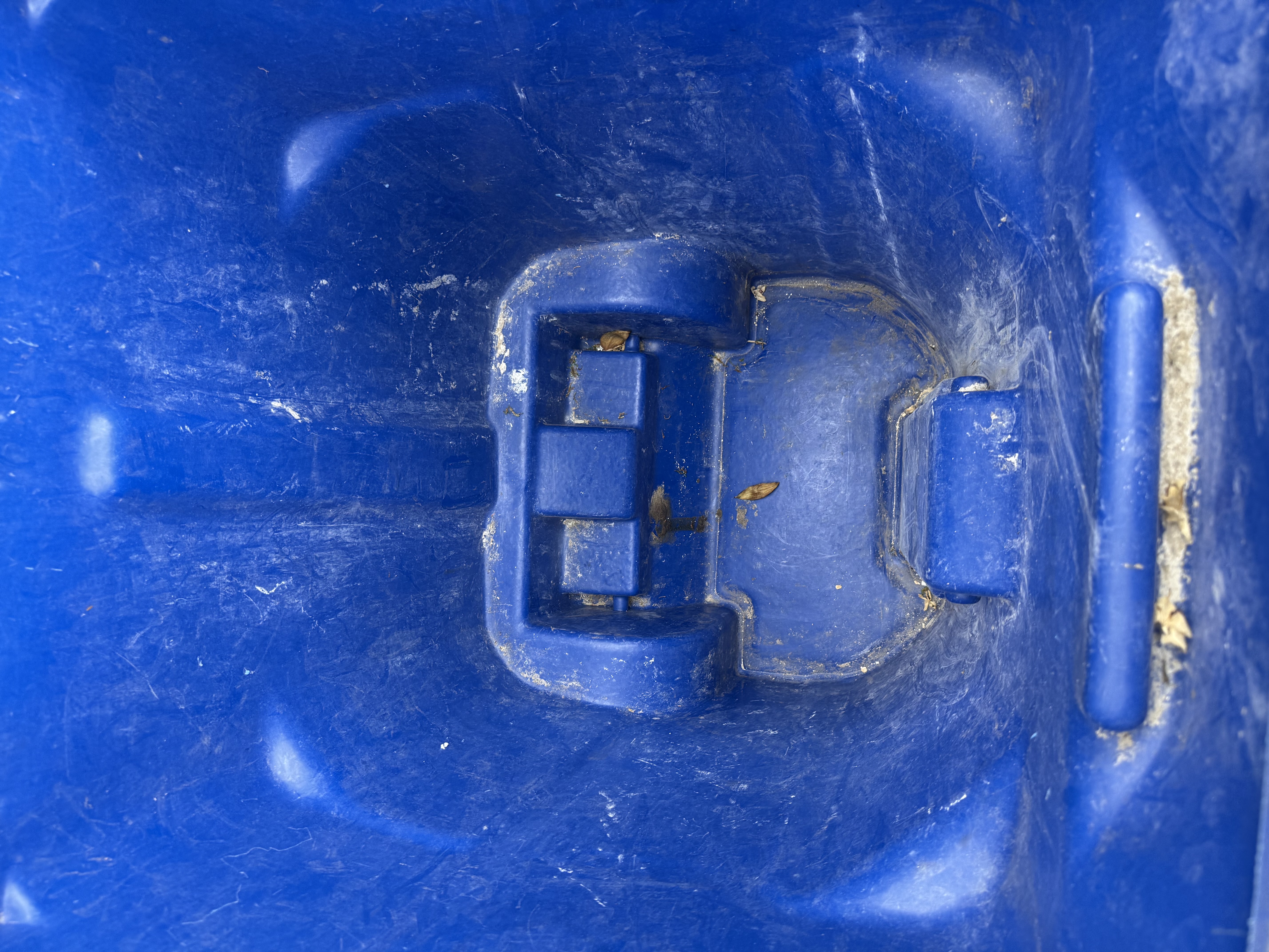 Close-up of heavy grime and buildup in a dirty can